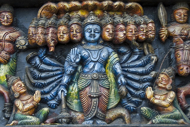 Wood carving of multi-headed Vishnu